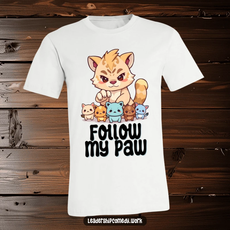 Funny t-shirt depicting a determined creature using its paw to guide a group of smaller creatures, emphasizing teamwork and direction.