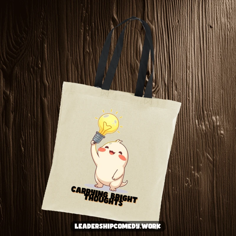 Funny tote bag with a joyful creature holding a large, glowing idea bulb, symbolizing bright concepts and creative endeavors.